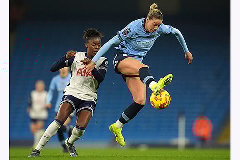Women's Super League: Tottenham Hotspur's Jessica Naz, left, and Manchester City's Alanna Kennedy battle for the ball
