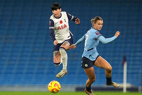 Women's Super League: Tottenham Hotspur's Ashleigh Neville, left, and Manchester City's Kerstin Casparij in action