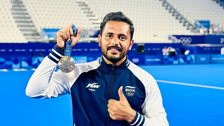 IND Hockey captain Harmanpreet Singh with his bronze medal. - X/13harmanpreet