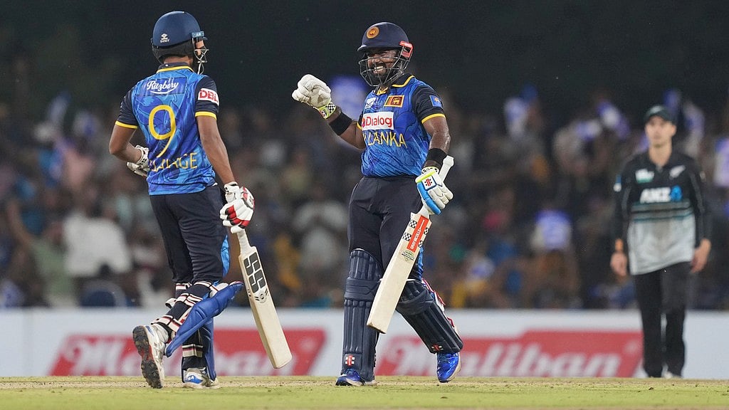 AP : Sri Lanka skipper Charith Asalanka and teammate Dunith Wellalage celebrates their win over New Zealand in the first T20I in Dambulla.