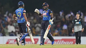 AP : Sri Lanka skipper Charith Asalanka and teammate Dunith Wellalage celebrates their win over New Zealand in the first T20I in Dambulla.