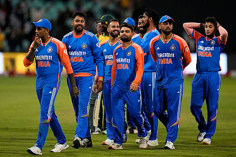 South Africa vs India: India's captain Suryakumar Yadav, left, with teammates leave the field after winning against South Africa
