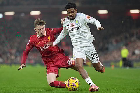 EPL 2024-25: Aston Villa's Ian Maatsen, right, and Liverpool's Conor Bradley battle for the ball