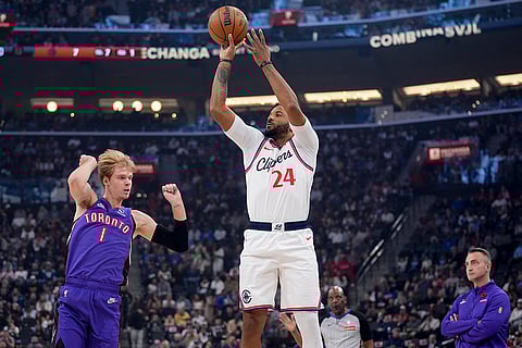 NBA: Los Angeles Clippers guard Norman Powell (24) shoots over Toronto Raptors guard Gradey Dick