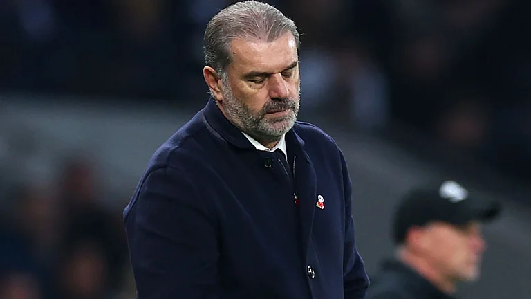 Tottenham boss Ange Postecoglou reacts - null