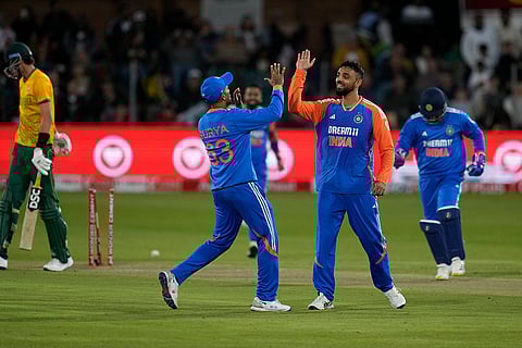 IND vs SA 2nd T20: India's Varun Chakravarthy, second right, celebrates with teammates after the dismissal of South Africa's Marco Jansen