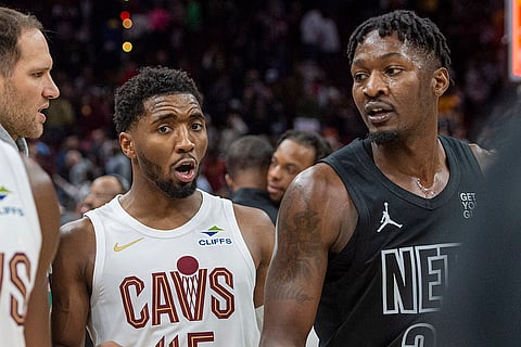 NBA: Donovan Mitchell speaks with Brooklyn Nets' Dorian Finney-Smith