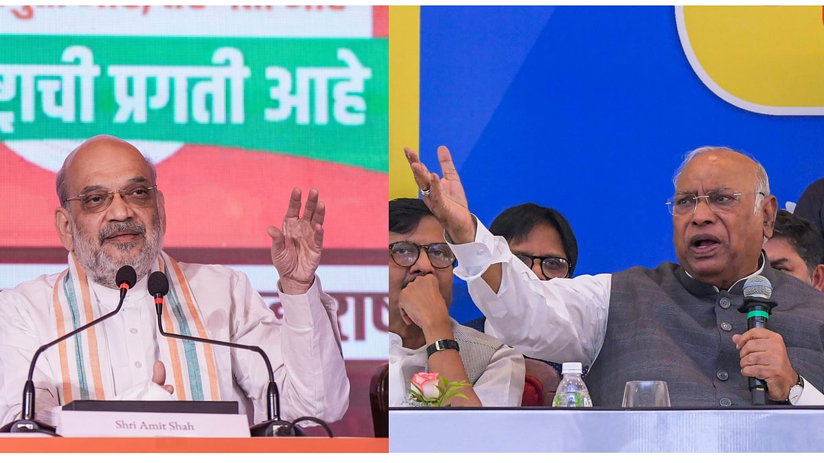 Amit Shah (L) and Mallikarjun Kharge (R) during the manifesto launch event. - PTI