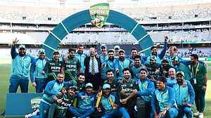 AP Photo/Trevor Collens : The Pakistan team pose with their trophy after winning their one-day international cricket match and series over Australia in Perth.