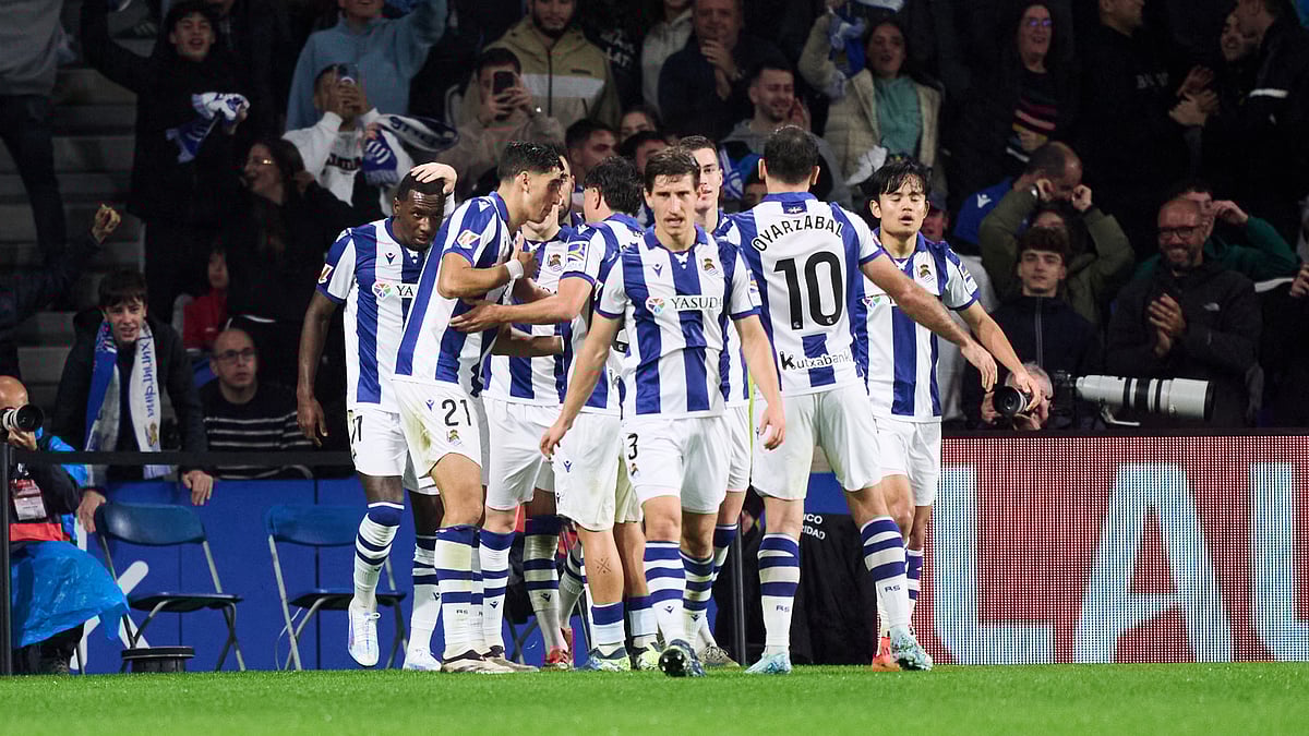 Real Sociedad's players celebrate Sheraldo Becker's goal
