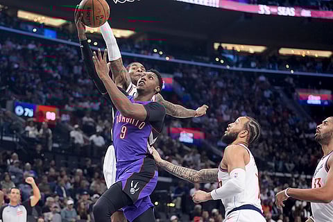 NBA: Toronto Raptors guard RJ Barrett (9) drives to the basket