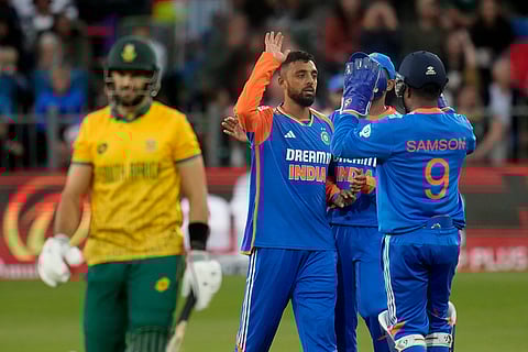 IND vs SA 2nd T20: India's Varun Chakravarthy, center, celebrates after the dismissal of South Africa's captain Aiden Markram