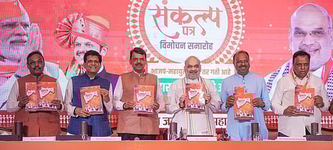nion Ministers Amit Shah and Piyush Goyal, Maharashtra Deputy Chief Minister Devendra Fadnavis, BJP National General Secretary Vinod Tawde, State BJP President Chandrashekhar Bawankule and BJP leader Ashish Shelar release party's manifesto for Maharashtra Assembly elections, in Mumbai, Sunday, Nov. 10, 2024.