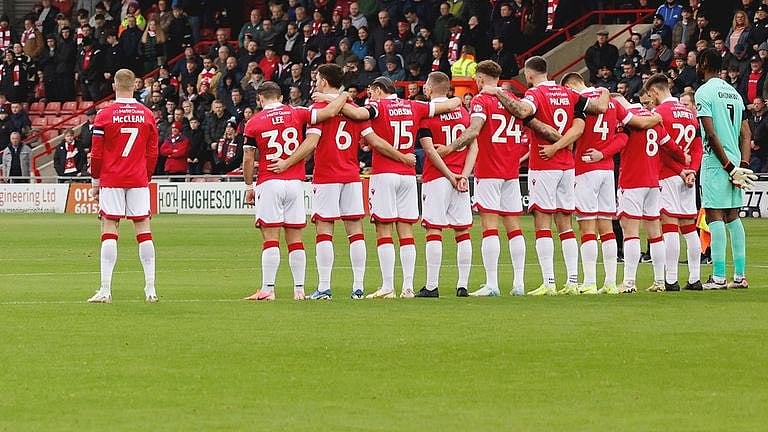 Photo: X | Brownie : Wrexham captain James McClean with his teammates on Remembrance Day.