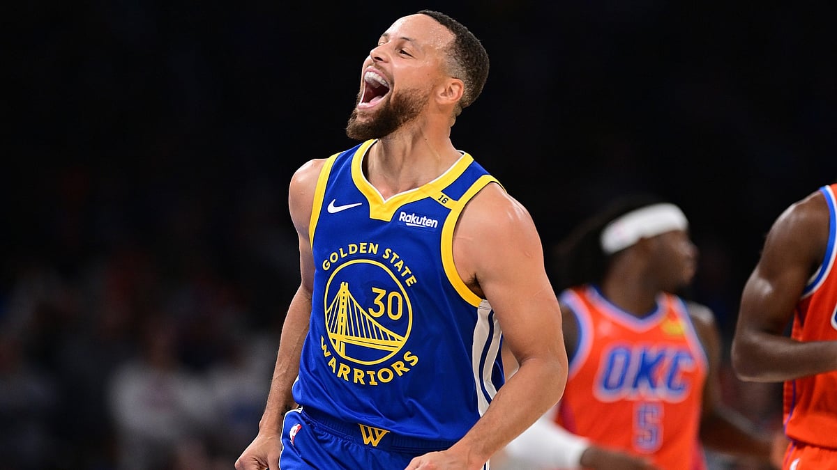 Golden State Warriors guard Stephen Curry celebrates vs. the Oklahoma City Thunder on Nov. 10, 2024. - null