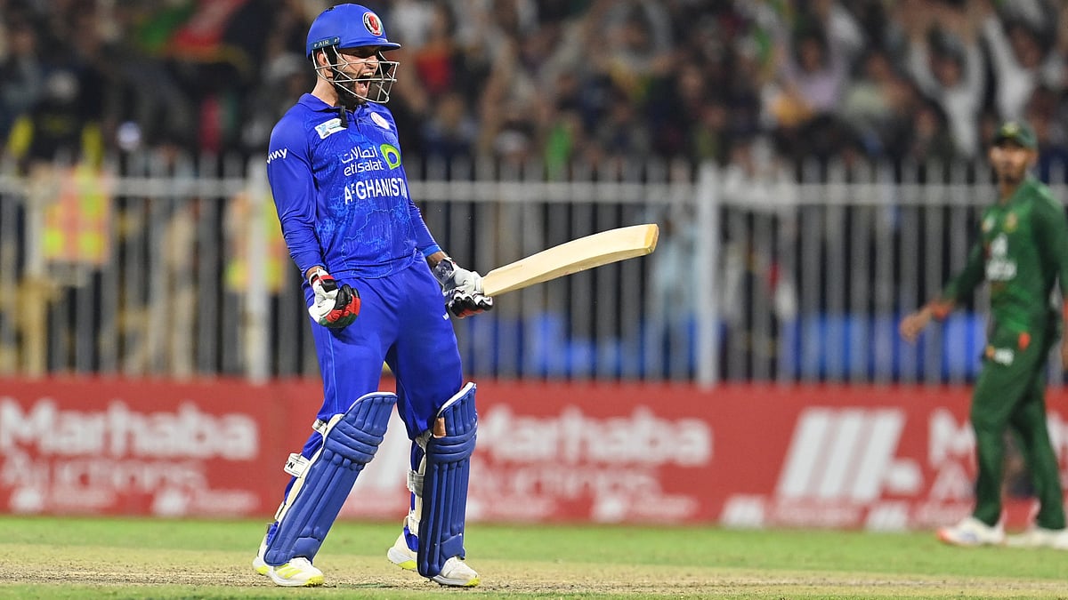 X/Afghanistan Cricket Board : Azmatullah Omarzai celebrates after Afghanistan beat Bangladesh by five wickets in the third ODI in Sharjah.