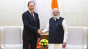 X/@narendramodi : Prime Minister Narendra Modi (R) with Russian Deputy PM Denis Manturov (L).