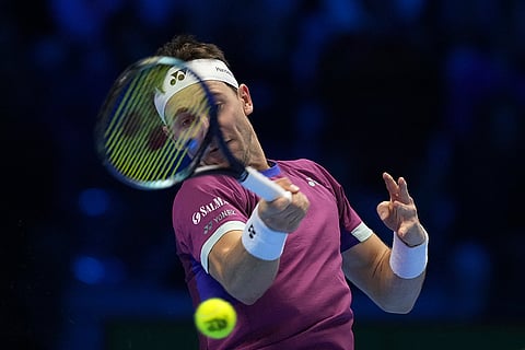 ATP Finals: Norway's Casper Ruud returns the ball to Spain's Carlos Alcaraz