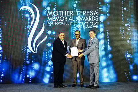 (L-R) Mr.Aaboo Varghese, Dr.Abraham Mathai, Shri. M.A.Sayeed