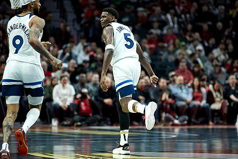 NBA Cup: Timberwolves guard Anthony Edwards (5) reacts after making a basket against the Trail Blazers