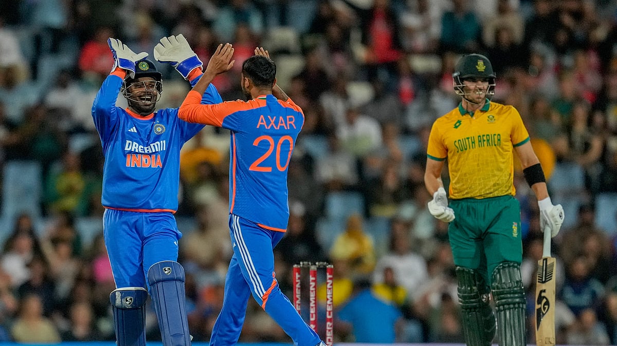AP Photo/Themba Hadebe : India's Axar Patel, centre, and Sanju Samson, left, celebrate the dismissal of South Africa's Tristan Stubbs during the third T20 International cricket match between South Africa and India, at Centurion Park in Centurion.