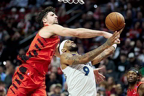 NBA Cup: Timberwolves guard Nickeil Alexander-Walker (9) is fouled by Trail Blazers forward Deni Avdija