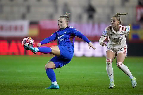 Women's Champions League: Valerenga's Olaug Tvedten clears the ball away from Bayern's Giulia Gwinn