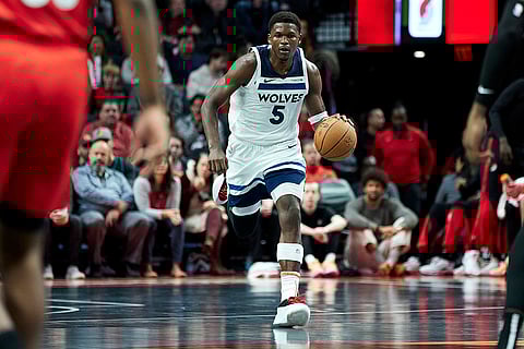 NBA Cup: Timberwolves guard Anthony Edwards brings the ball up court against the Trail Blazers