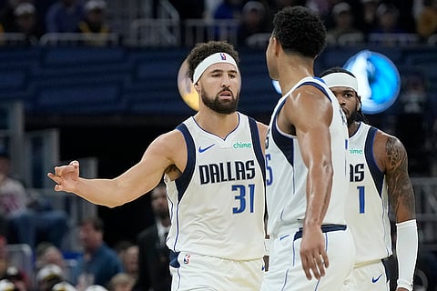NBA Cup: Mavericks guard Klay Thompson (31) is congratulated by teammates after shooting a 3-point basket
