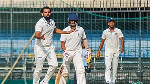 Photo: PTI : Mohammed Shami in Ranji Trophy action for Bengal.