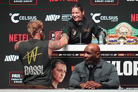 Tyson vs Paul boxing: Jake Paul, left, bets his purse with Katie Taylor