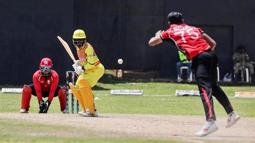Photo: X | Nnalubaale Sports : Hong Kong cricket team fielding against Uganda.