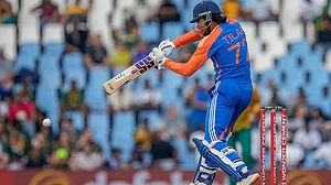 | Photo: AP/Themba Hadebe : Ind vs SA 3rd T20I: India's Tilak Varma plays a shot.