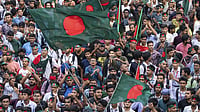 AP : (FILE) Student protesters with Bangladeshi flag |
