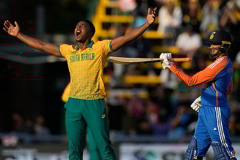 IND vs SA 4th T20: South Africa's Lutho Sipamla, left, celebrates the dismissal of India's Abhishek Sharma