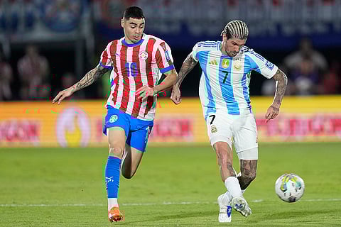 FIFA World Cup 2026 Qualifiers: Argentina's Rodrigo De Paul (7) and Paraguay's Miguel Almiron battle for the ball