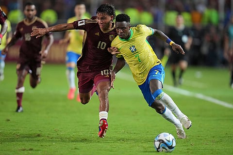 FIFA World Cup 2026 Qualifiers: Brazil's Vinicius Junior, right, and Venezuela's Telasco Segovia battle for the ball