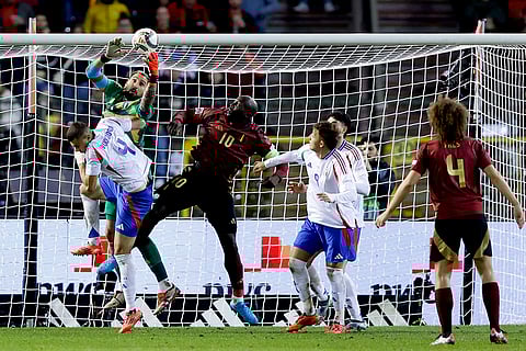 UEFA Nations League soccer: Belgium's Romelu Lukaku, center, makes an attempt on goal