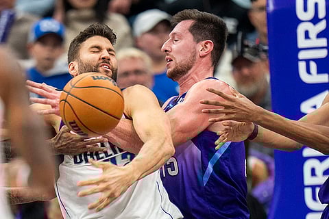 NBA Mavericks vs Jazz Basketball: Mavericks forward Maxi Kleber, left, gets tangled up with Jazz forward Drew Eubanks