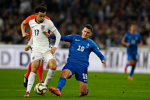 UEFA Nations League soccer: Christos Tzolis of Greece, right, challenges England's Curtis Jones