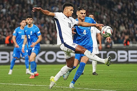 UEFA Nations League soccer: England's Ollie Watkins, front, and Lazaros Rota of Greece, fight for the ball