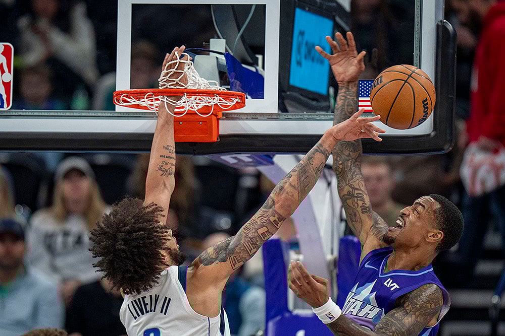 | Photo: AP/Rick Egan : NBA Mavericks vs Jazz Basketball: Mavericks center Dereck Lively II, blocks a shot by Jazz forward John Collins