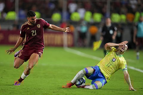 FIFA World Cup 2026 Qualifiers: Brazil's Gabriel Martinelli, right, is fouled by Venezuela's Alexander Gonzalez
