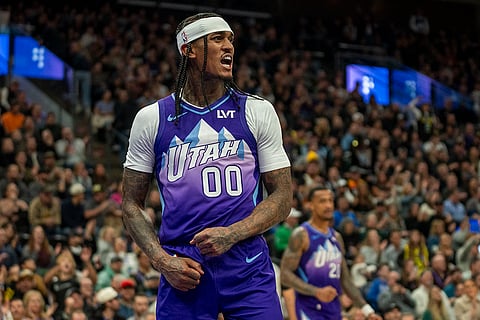 NBA Mavericks vs Jazz Basketball: Jazz guard Jordan Clarkson (00) reacts after drawing a foul as he scores for Utah