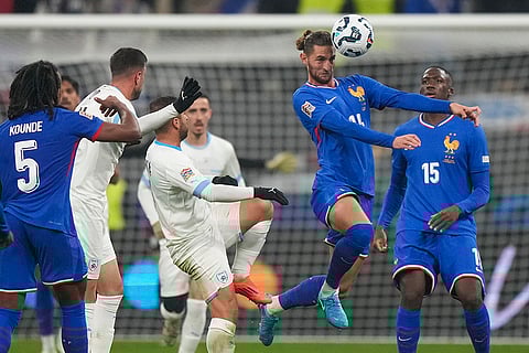 UEFA Nations League soccer: France's Adrien Rabiot heads the ball against Israel