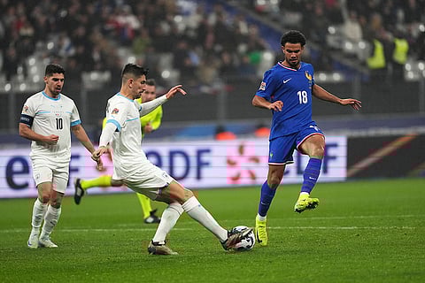 UEFA Nations League soccer: France's Warren Zaire-Emery, right, and Israel's Idan Nachmias challenge for the ball