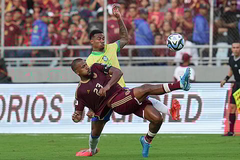 FIFA World Cup 2026 Qualifiers: Venezuela's Salomon Rondon, front, and Brazil's Gabriel Magalhaes battle for the ball