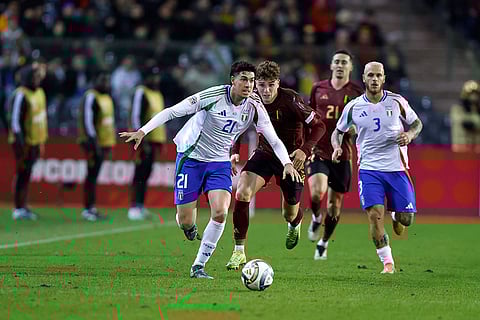 UEFA Nations League soccer: Italy's Alessandro Bastoni, left, is pursued by Belgium's Arne Engels
