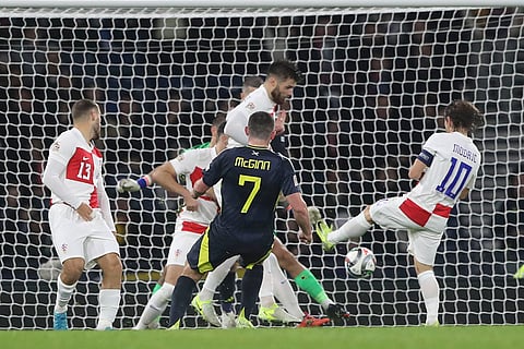 UEFA Nations League: Scotland's John McGinn, front, scores the opening goal