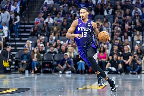 NBA: Kings forward Keegan Murray dribbles upcourt